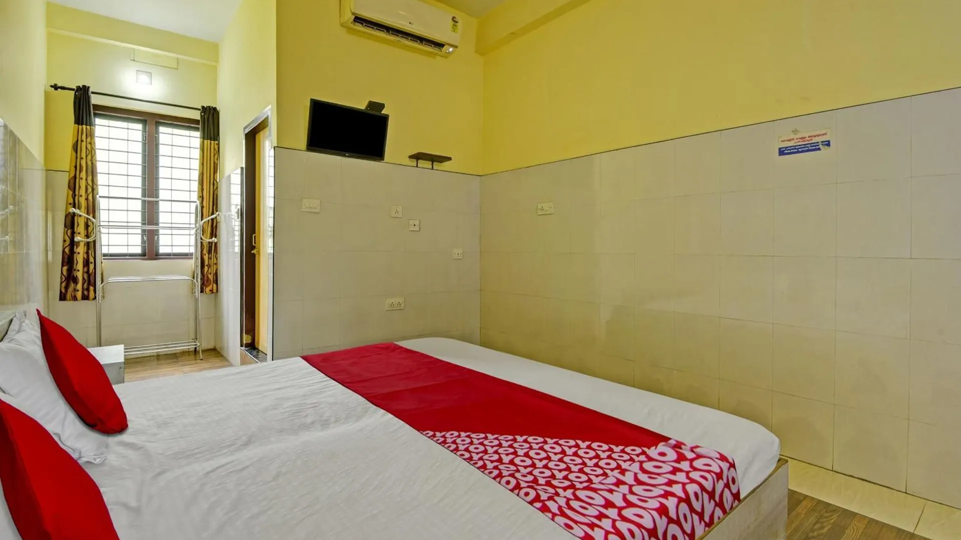 Hotel O Malabar Tourist Home Koduvally Kunnamangalam インド
